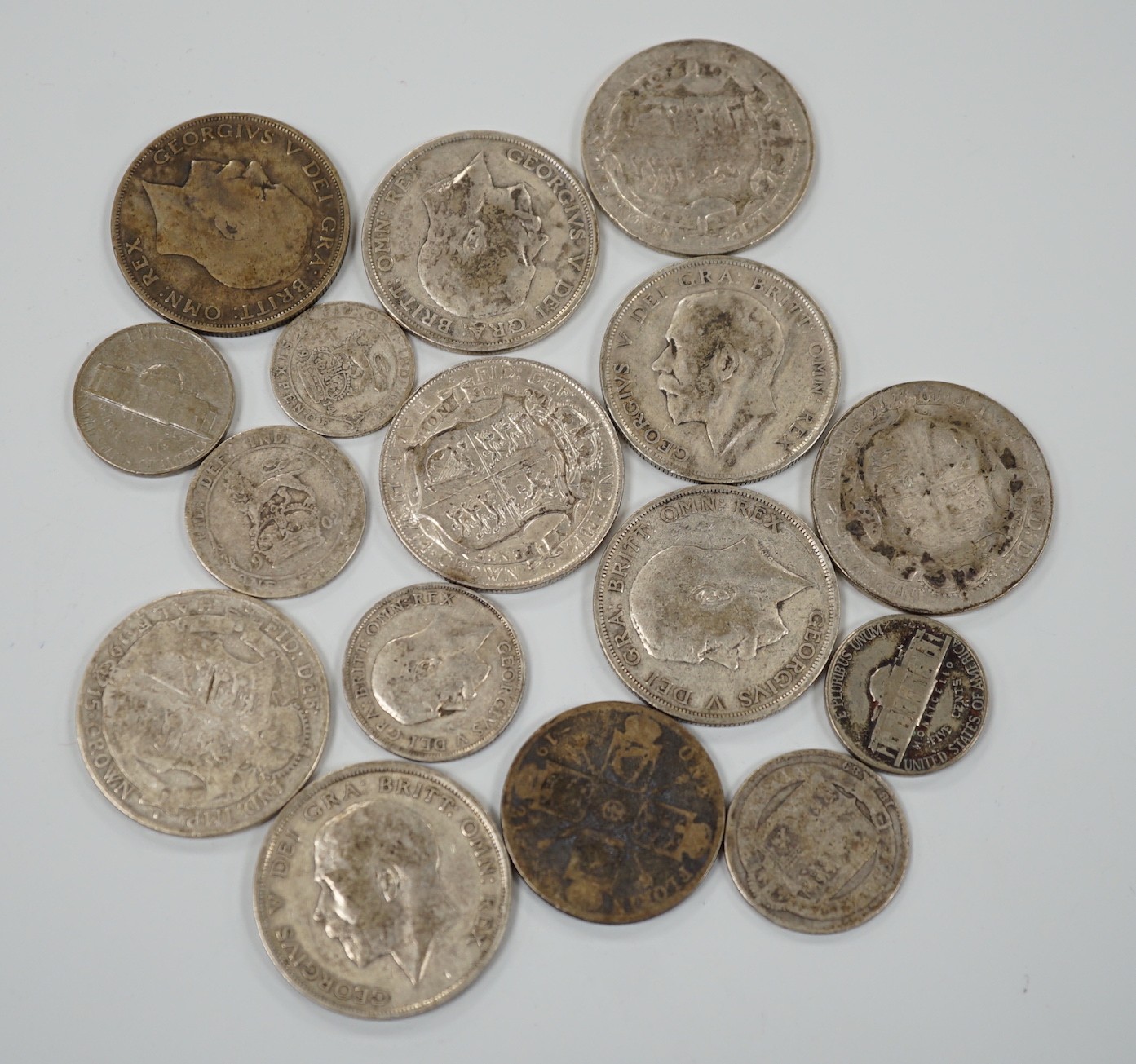 A selection of silver and cupro nickel coins, dating from Victoria to George V